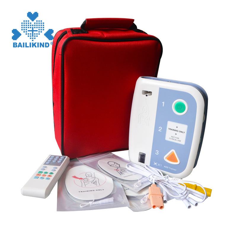 Πώς να χρησιμοποιήσετε το AED Trainer Automated External Defibrillator Teaching Εκπαίδευση Πρώτων Βοηθειών για Δίγλωσσα Εργαλεία διδασκαλίας του σχολείου CPR